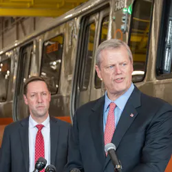 Gov. Charlie Baker outlines the plan to accelerate MBTA capital projects; MBTA General Manager Steve Poftak appears in the background. Gov. Charlie Baker outlines the plan to accelerate MBTA capital projects; MBTA General Manager Steve Poftak appears in the background.