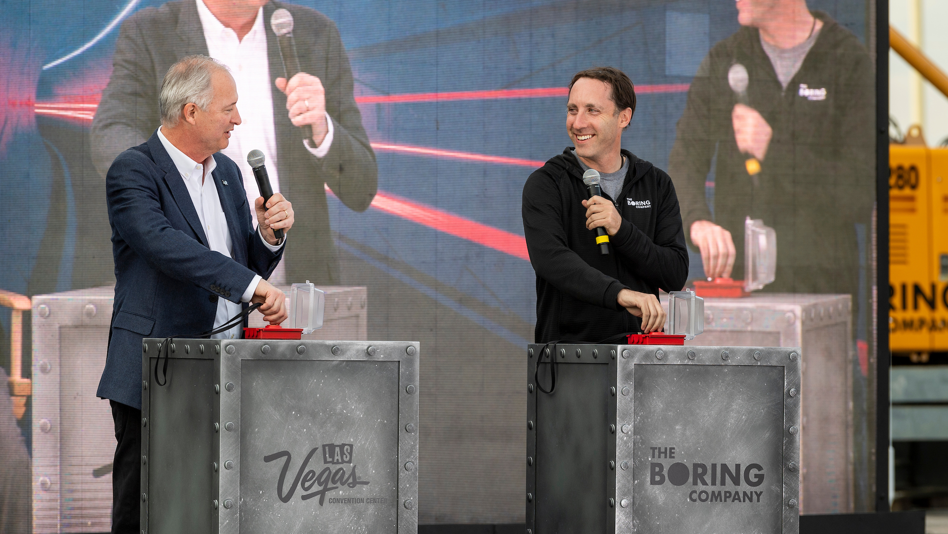 LVCVA CEO Steve Hill, left, and Boring Company President Steve Davis turn the start keys as The Boring Company and Las Vegas Convention and Visitors Authority mark the start of tunneling for the The Boring Company&rsquo;s people mover at the Las Vegas Convention Center on Friday, Nov. 15, 2019.