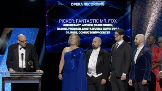 Andrew Craig Brown, third from the right, receives his first Grammy Award Jan. 26.