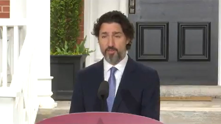 A screen grab shows Prime Minister Justin Trudeau announcing communities in Canada will receive an accelerated payment from the Gas Tax Fund to help kickstart local economies.