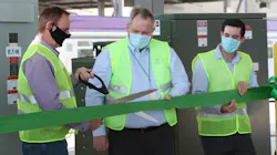 Officials cut the official ribbon celebrating the activation of the solar panels. Officials cut the official ribbon celebrating the activation of the solar panels.