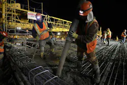 Met Council Workers pour concrete on the bridge where the Lake Street Station of the Orange Line will be built. Met Council Workers pour concrete on the bridge where the Lake Street Station of the Orange Line will be built.