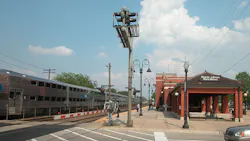 A Metra train at the Downers Grove Main Street station. A Metra train at the Downers Grove Main Street station.