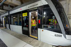 Crews sit in the parked light rail vehicle at Keelesdale Station as part of recent testing. Crews sit in the parked light rail vehicle at Keelesdale Station as part of recent testing.
