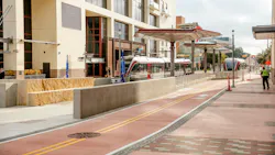 The station also features parasol structures mounted on columns, offering a striking visual welcome to downtown and overhead protection for customers as they wait for, enter or exit the train cars. The station also features parasol structures mounted on columns, offering a striking visual welcome to downtown and overhead protection for customers as they wait for, enter or exit the train cars.