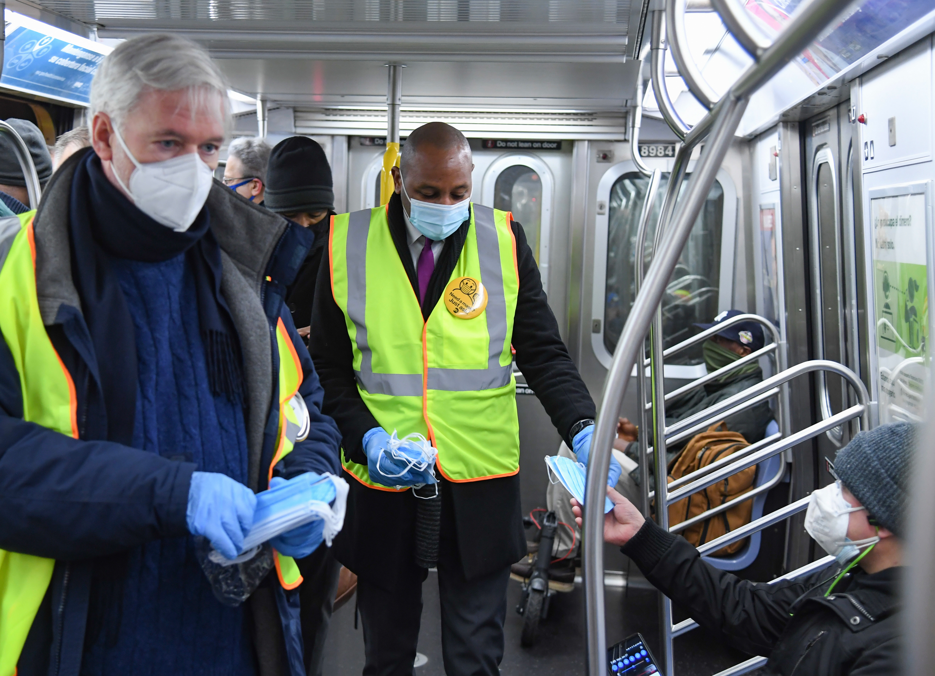 MTA Chairman & CEO Patrick J. Foye, Chief Operating Officer Mario P&eacute;loquin, and Queens Borough President Donovan Richards participate in Mask Force aboard an E train.