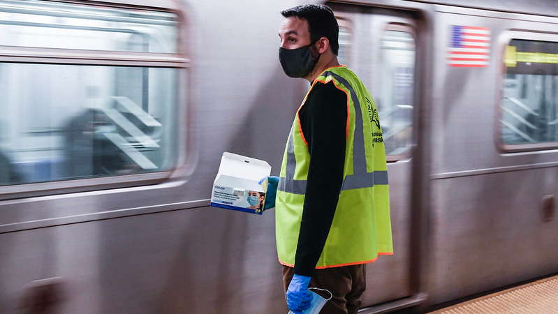 New York City City Council Member Keith Powers participates in MTA's Mask Force mask distribution effort on Feb. 25.