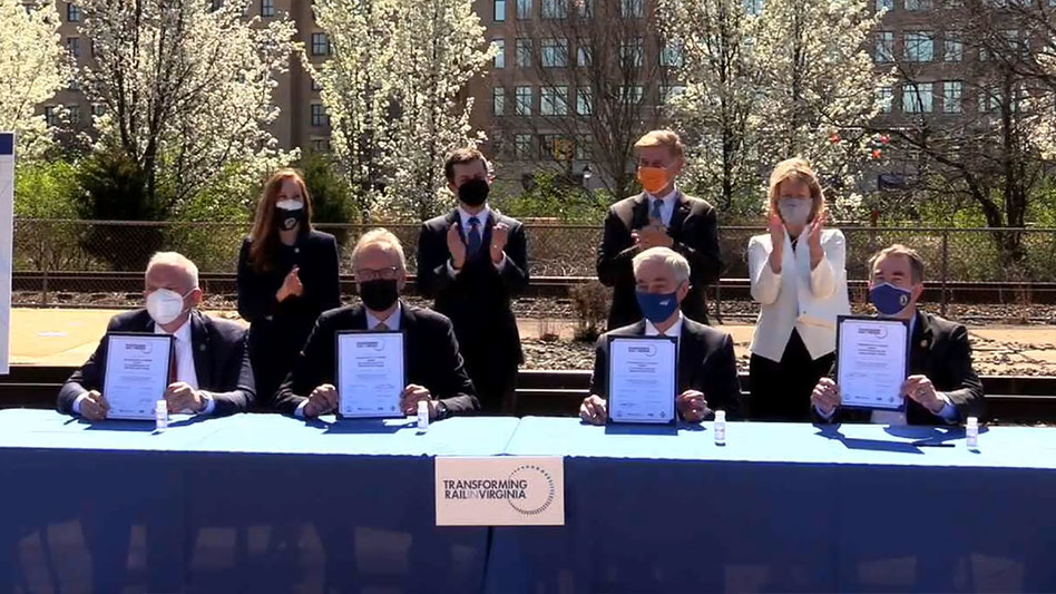 Officials signed agreements for the Transforming Rail in Virginia initiative on March 30 at the Amtrak/VRE station in Alexandria, Va.