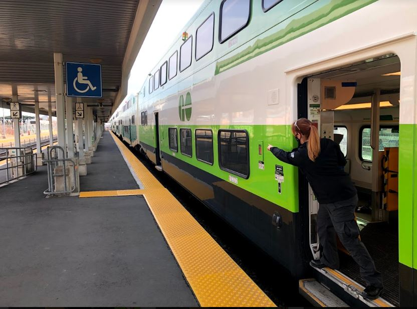 Katelyn Drysdale is seen here identifying a &lsquo;good spot&rsquo; as well as pointing and calling &lsquo;clear right, clear left&rsquo; before opening the remaining doors of the train for passengers.