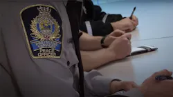 A Edmonton Transit Peace Officer insignia on the arm of a uniform. A Edmonton Transit Peace Officer insignia on the arm of a uniform.