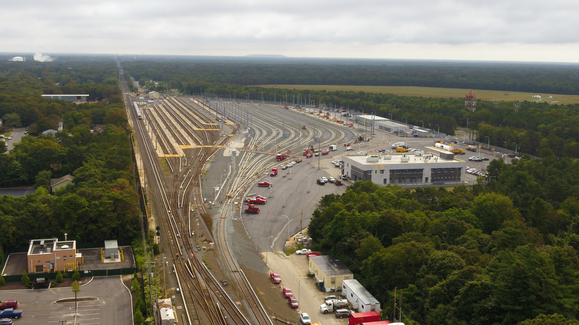 An overview of the entire project site for the LIRR Mid-Suffolk Train Yard. The 11 new tracks are seen at the right, as is the new employee facility.