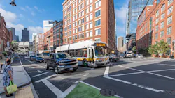 Two Route 111 buses travel along a congested stretch of North Washington Street near Causeway Street in Boston before construction of a northbound bus lane. Two Route 111 buses travel along a congested stretch of North Washington Street near Causeway Street in Boston before construction of a northbound bus lane.