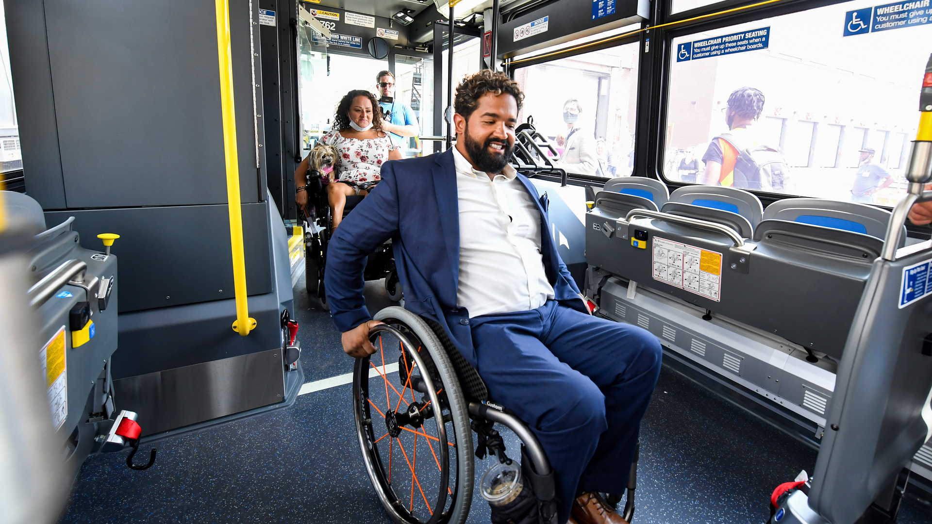 Quemuel Arroyo tests out a new bus vehicle.