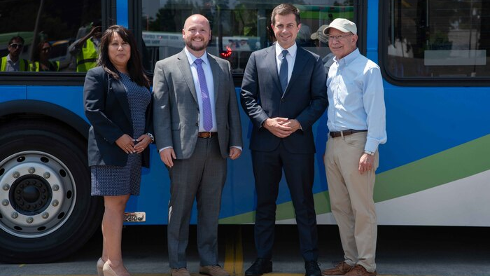 Left to right, LTD General Manager Aurora Jackson, Deputy Assistant Secretary Edward McGlone, Secretary Buttigieg and U.S. Rep. DeFazio.