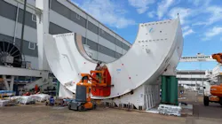 Herrenknecht crews working on the lower half of the tunnel boring machine forward shield. Herrenknecht crews working on the lower half of the tunnel boring machine forward shield.