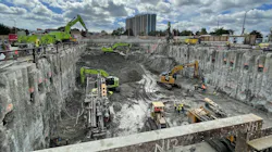 Excavators and other heavy machinery are digging deep to build the launch shaft for the tunnel boring machine. Excavators and other heavy machinery are digging deep to build the launch shaft for the tunnel boring machine.