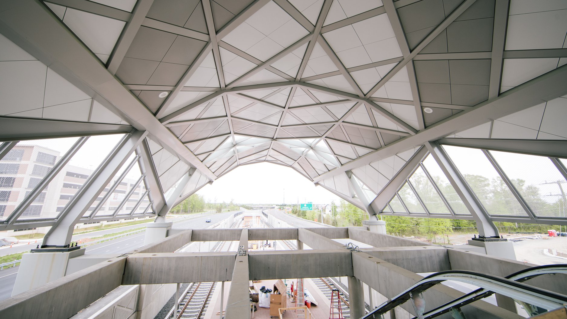 In this 2019 image, the still under construction Dulles International Airport station is seen. The second phase of the Metrorail Silver Line extension has reached substantial completion.