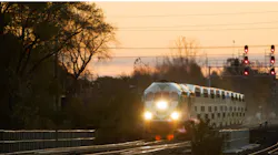 A GO train makes its way down the line. A GO train makes its way down the line.