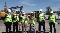 Officials used spike mauls to drive gold spikes into ties to mark the start of construction of the South Shore Double Track NWI project on June 21. Officials used spike mauls to drive gold spikes into ties to mark the start of construction of the South Shore Double Track NWI project on June 21.