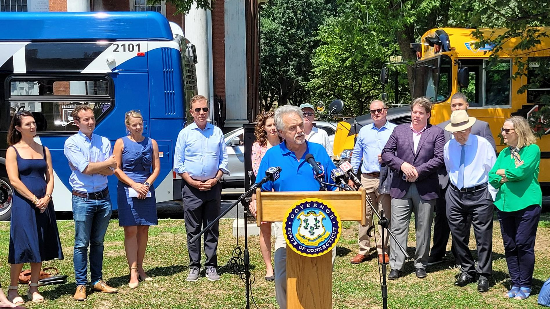 Oficials and environmental stakeholders gathered on the New Haven Green to announce the new law.