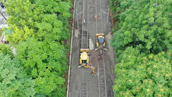 Crews use heavy equipment to make repairs to the MetroLink trackbed that was damaged by historic rains at the end of July. Crews use heavy equipment to make repairs to the MetroLink trackbed that was damaged by historic rains at the end of July.