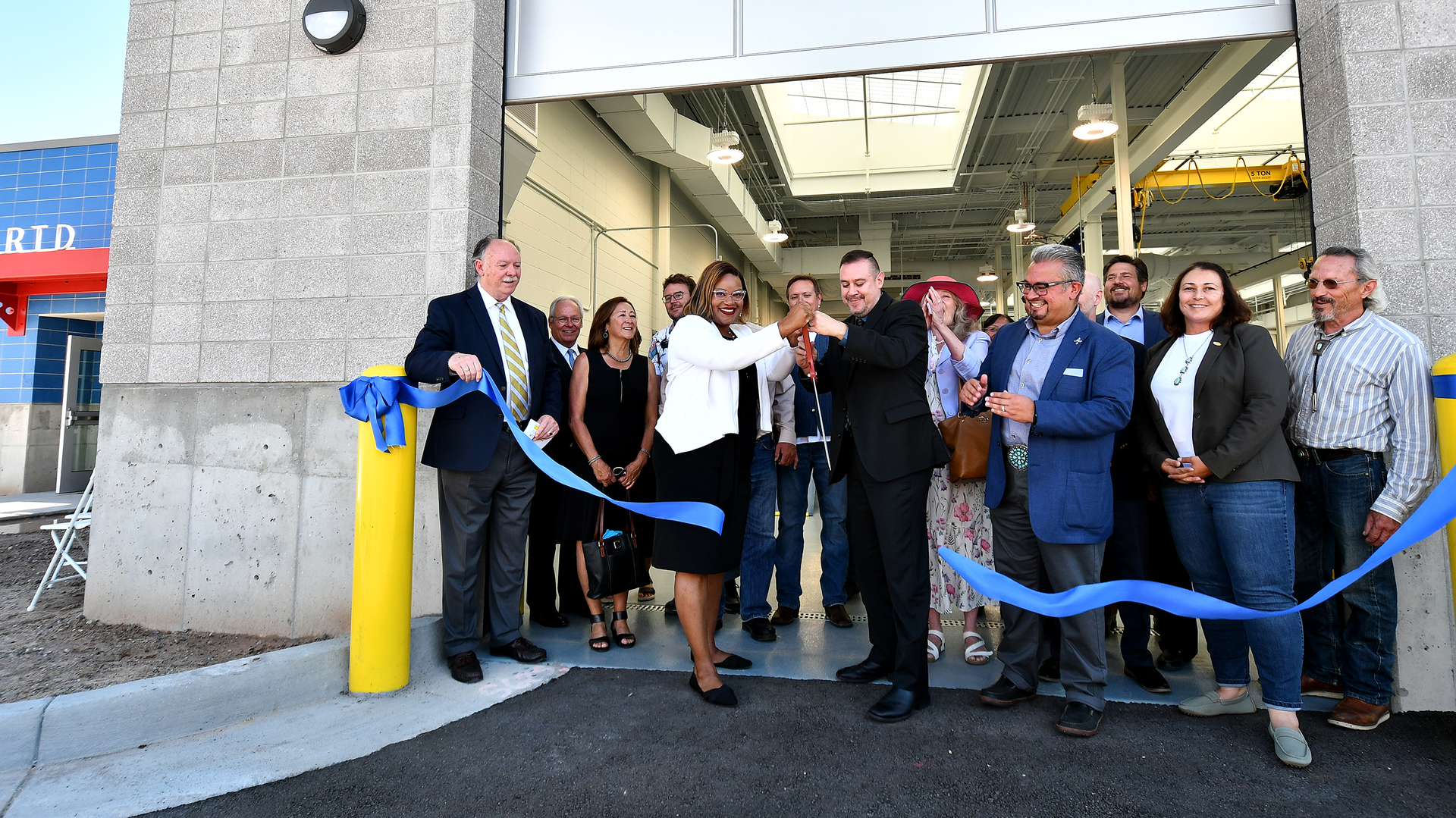 At center is FTA Senior Advisor Veronica McBeth and NCRTD Chair and City of Espa&ntilde;ola Councilor Dennis Tim Salazar cut the ribbon to inaugurate the $11 million NCRTD maintenance facility, wash bay and fueling station in Espa&ntilde;ola, N.M.