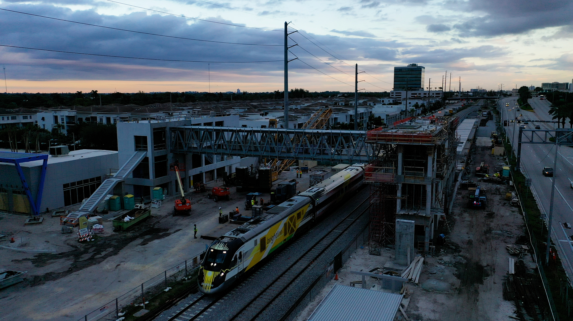 Crews worked early during the morning hours of Oct. 8 to place place a 131-foot long, 68-ton pedestrian skybridge on two 41-foot-high vertical transportation towers at Aventura Station.