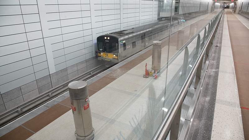 A LIRR train moves through the new platform of the new Grand Central Madison.