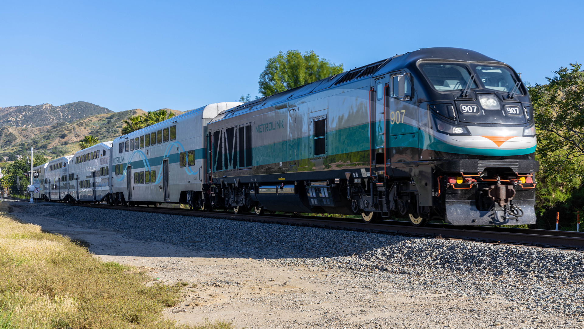 A Metrolink train traveling in the Simi Valley.