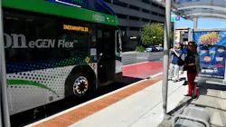 An eGen Flex Hybrid Bus Parked at the Super Stop on Delaware and New York streets. An eGen Flex Hybrid Bus Parked at the Super Stop on Delaware and New York streets.