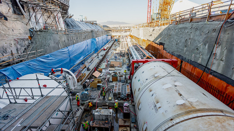View of the future Great Northern Way-Emily Carr station site ahead of the launch of Elsie, the first of two tunnel boring machines on the right. Phyllis, the second tunnel boring machine, is being assembled on the left.