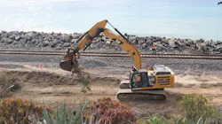 Excavator picking up dirt Excavator picking up dirt