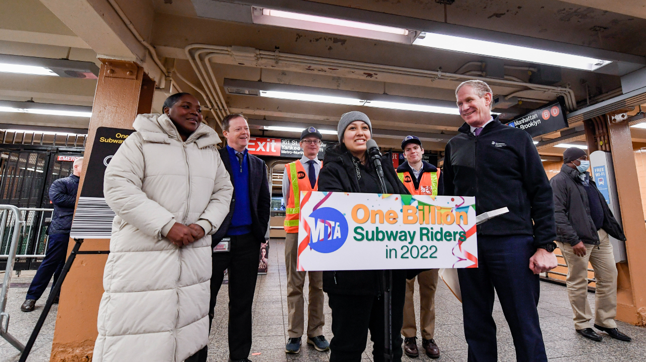 MTA Chair & CEO Janno Lieber, NYCT President Richard Davey and Acting Chief Customer Officer Shanifah Rieara recognize Bronx resident Sasha Salazar as the one billionth subway rider of 2022 during a ceremony at the 161 St. Yankee Stadium station on Dec. 27, 2022.