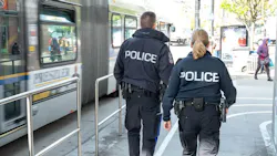 Two Metro Vancouver Transit Police officers on patrol. Two Metro Vancouver Transit Police officers on patrol.