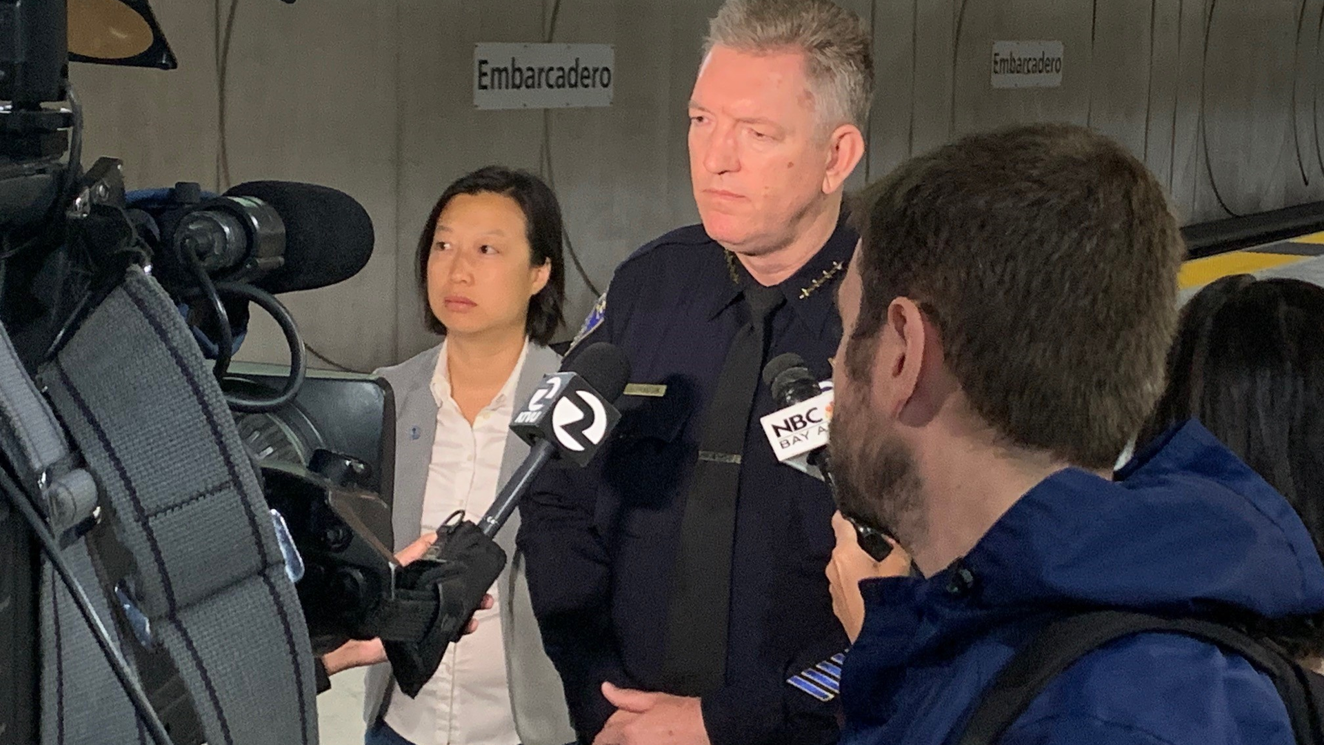 BART Board President Janice Li, left, and Interim BART Police Department Chief Kevin Franklin speak with reporters at Embarcadero Station to highlight the arrest reports from March and April.