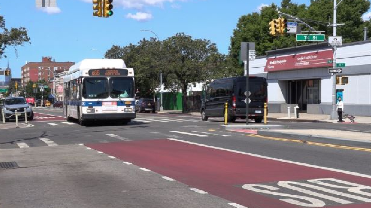 The Q66 bus using new offset bus lane on Northern Boulevard.
