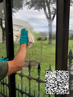 Cleaning of a BRTA shelter with QR code to graffiti cleaning video. Cleaning of a BRTA shelter with QR code to graffiti cleaning video.