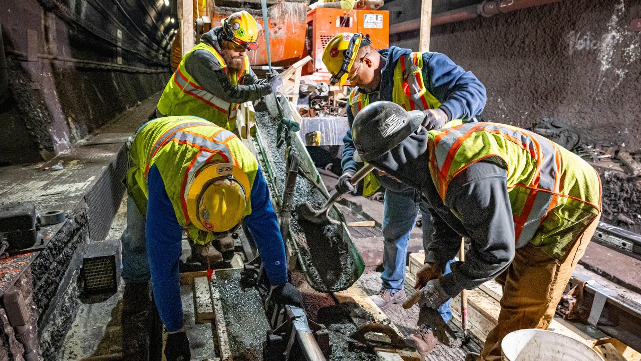 Crews repaired concrete slabs along the Red Line track area.