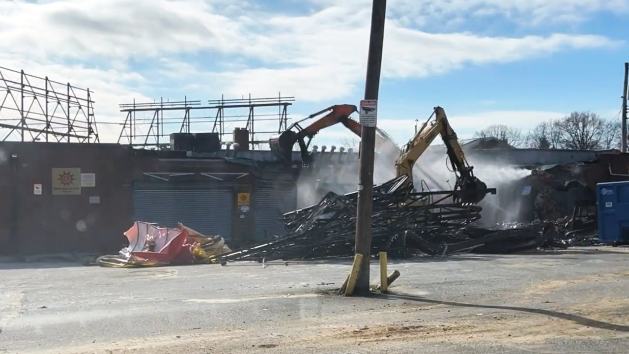 Two local small businesses have mobilized crews and equipment and begun demolition for the first of 47 residential and commercial properties that have been acquired by Amtrak.