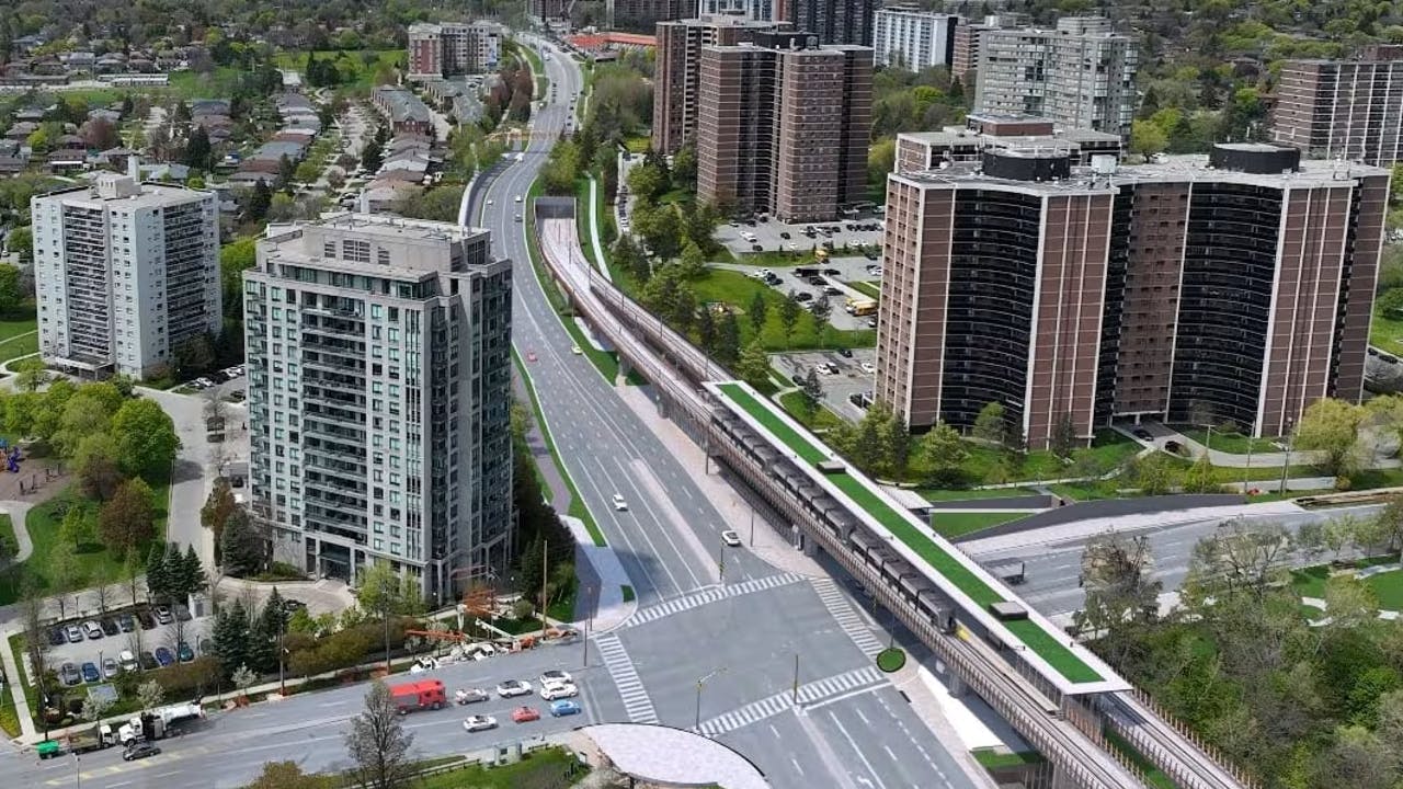A rendering showing an aerial view of the elevated section of the Eglinton Crosstown West Extension.