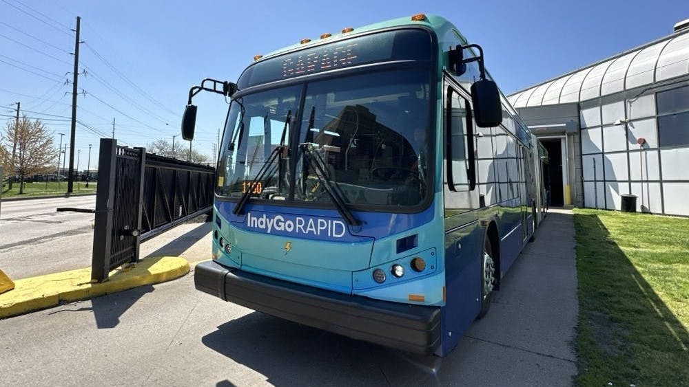 IndyGo unveils 60-foot electric buses for future Purple Line BRT route.