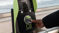 A PRESTO Card being swiped against a PRESTO fare reader. A PRESTO Card being swiped against a PRESTO fare reader.
