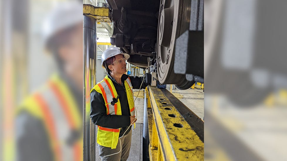Briony Croft taking wheel surface measurements.