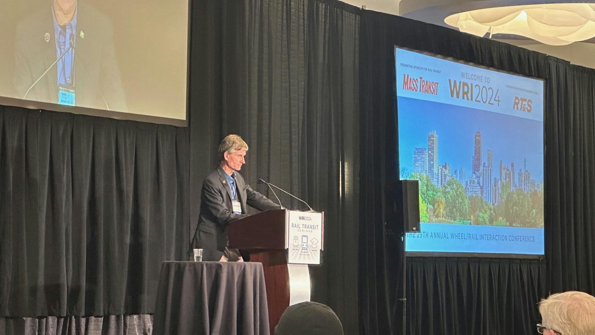 Gordon Bachinsky, Wheel-Rail Seminars founder, speaks during WRI2024 Rail Transit Seminar on May 21 in Rosemont, Ill.