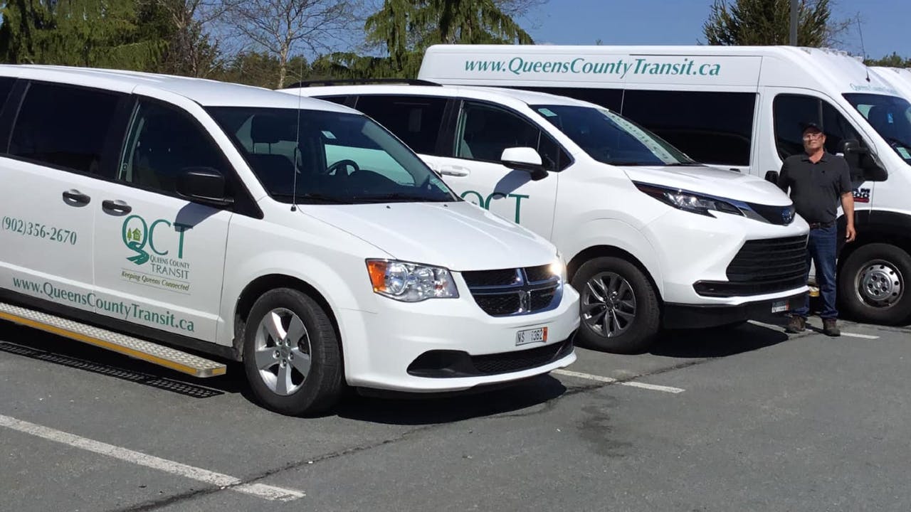Queens County Transit vehicles.