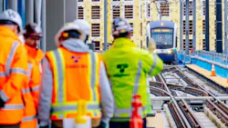Sound Transit employees greet an approaching test train operator during a station tour in March 2024. Sound Transit employees greet an approaching test train operator during a station tour in March 2024.