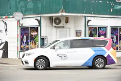 A Metro Flex vehicle traveling through the neighborhood at S Cloverdale St. A Metro Flex vehicle traveling through the neighborhood at S Cloverdale St.