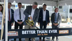 Indiana Gov. Eric Holcomb cuts the ribbon on the NICTD Double Track Northwest Indiana project. The double track project will allow NICTD to run 14 additional weekday trains on the South Shore Line. Indiana Gov. Eric Holcomb cuts the ribbon on the NICTD Double Track Northwest Indiana project. The double track project will allow NICTD to run 14 additional weekday trains on the South Shore Line.