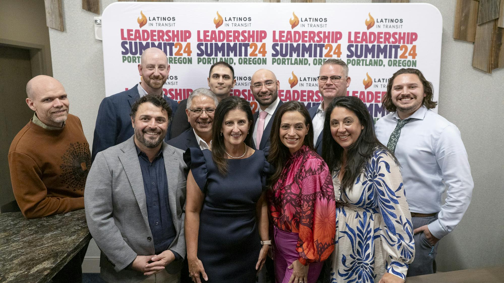 A group of LITLA graduates pose with representatives from WeDriveU.