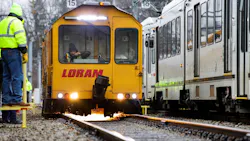 a yellow loram rail grinder operates on track a yellow loram rail grinder operates on track